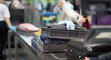 bags in trays at security dublin airport