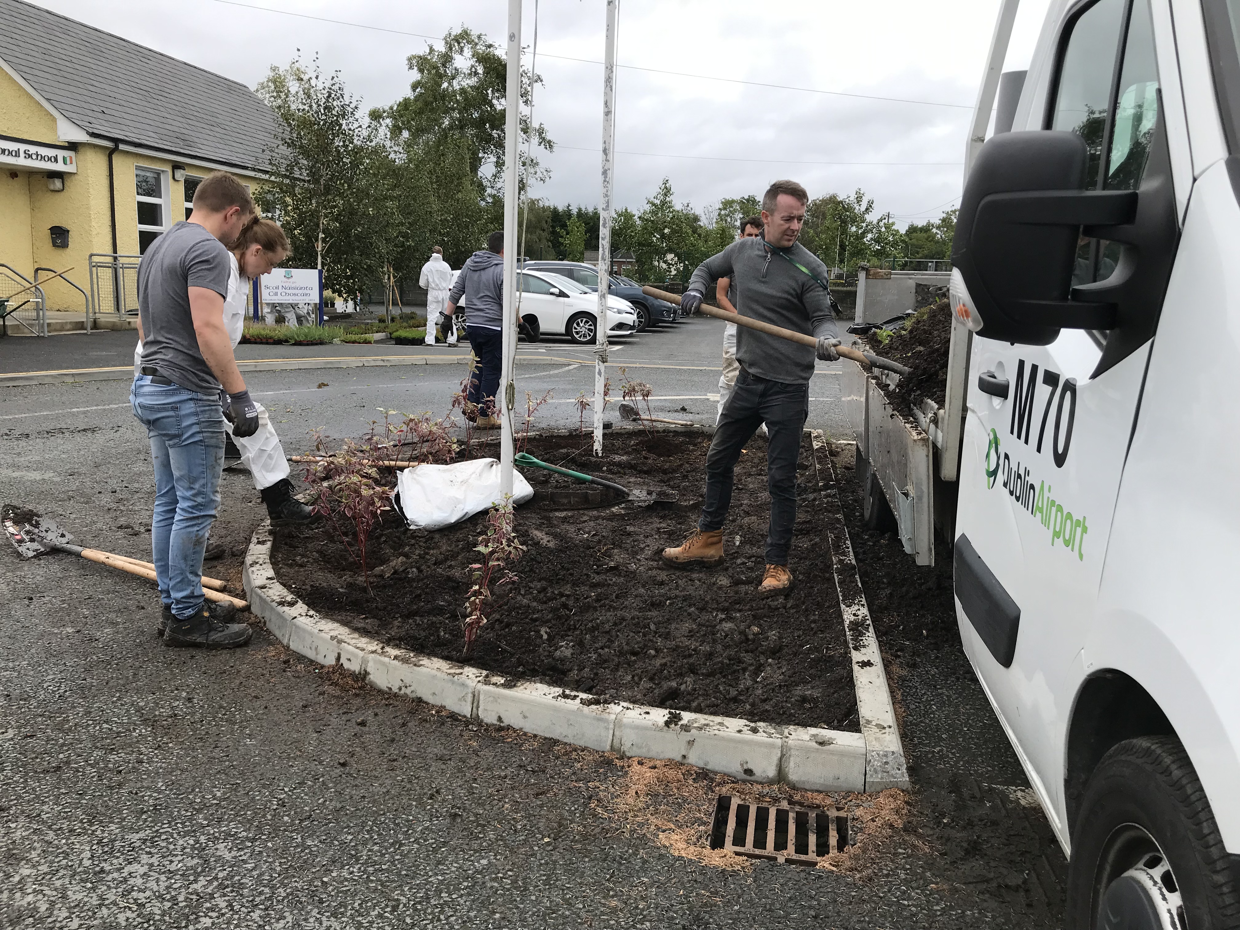 Dublin Airport's AMD carry out gardening works in a local school