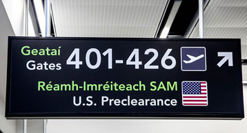 US-precelearance-_gates_sign US-precelearance-_gates_sign