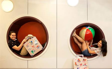 man and woman in circular seating