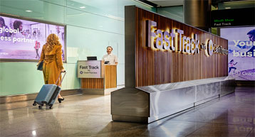 woman at security fast track desk